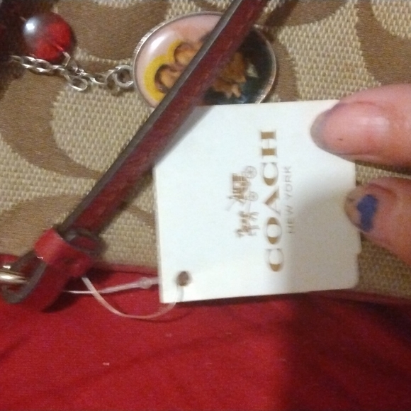 NWTs Coach wristlet - Picture 3 of 4